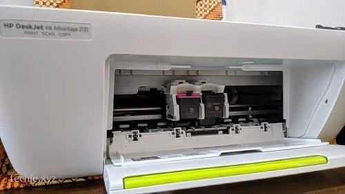 Cara Reset Printer HP 2135 - Letakkan dudukan cartridge di tengah jalurnya secara manual